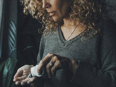Woman taking pills