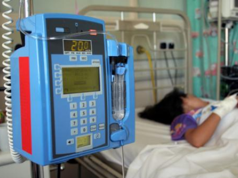 Young child in hospital bed