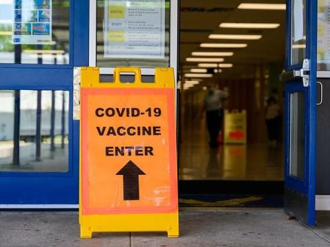 COVID vaccine sign