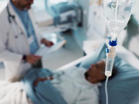 Hospital patient with IV drip