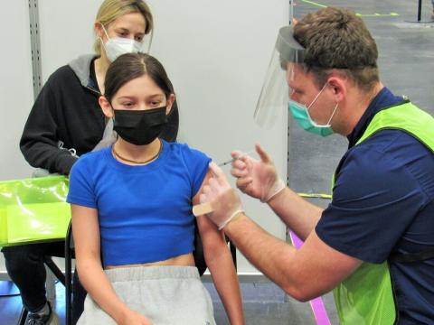 12-year-old girl getting COVID vaccine