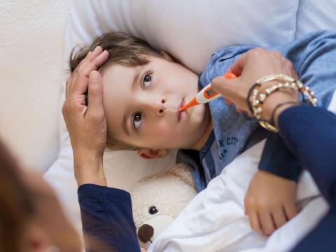 Boy with thermometer