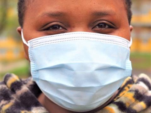 Closeup of woman wearing a facemask