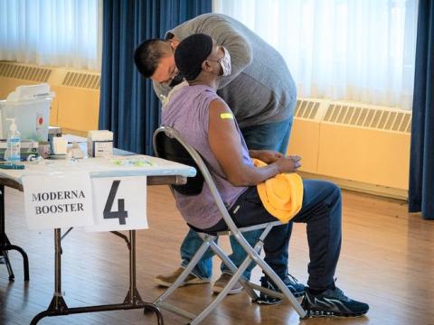 Man getting COVID booster shot