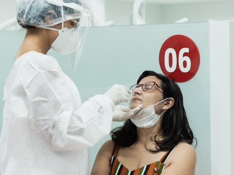 Woman getting COVID-19 swab test