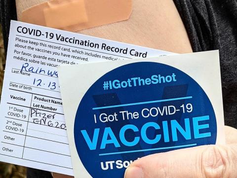 COVID vaccine sticker and card