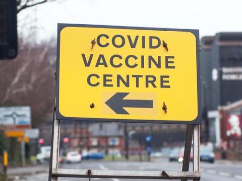 COVID Vaccine Centre sign in UK