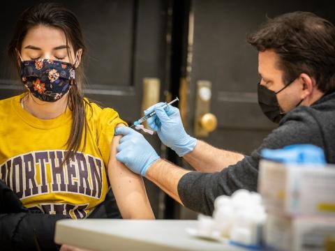Teacher receiving the COVID-19 vaccine