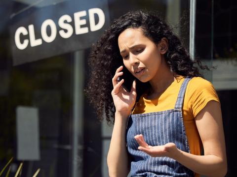 Distressed woman on phone