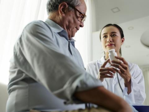 Doctor prescribing medicine
