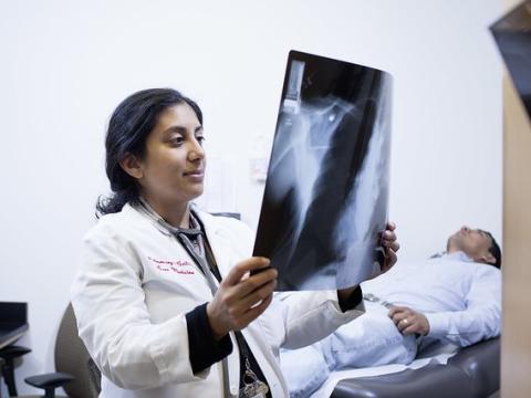 Doctor reading TB lung x-ray