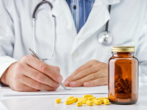 Doctor writing prescription
