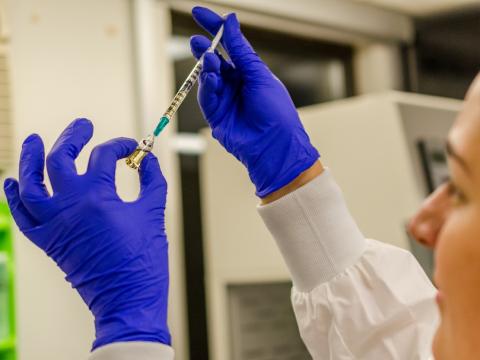Drawing vaccine from a vial
