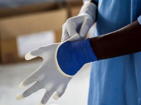 Ebola gloving up
