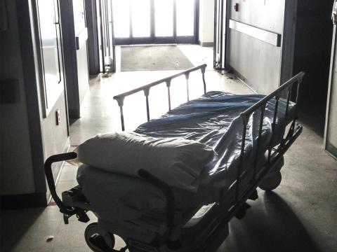 Empty gurney in hospital corridor
