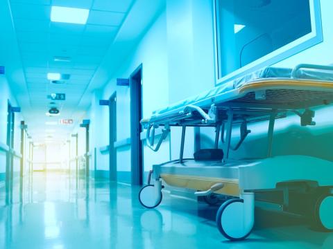 Empty gurney in hospital corridor