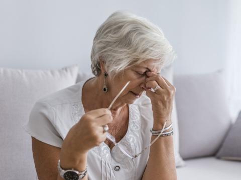 Exhausted older woman