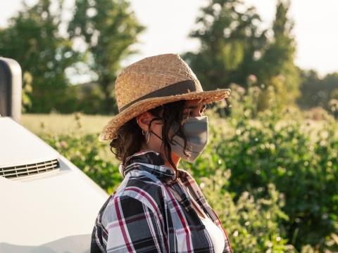 Farmer wearing mask