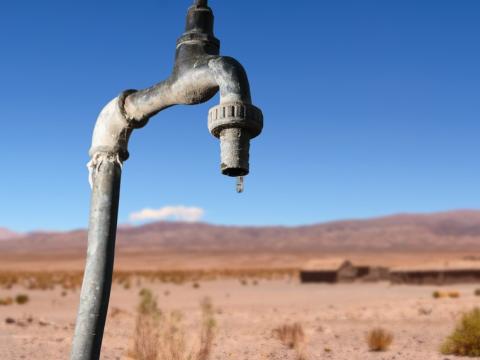 Faucet dripping in the desert