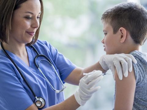 Child getting flu shot
