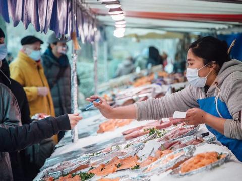 Fish market in France, mask wearing