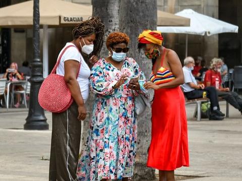 Group of women wearing masks