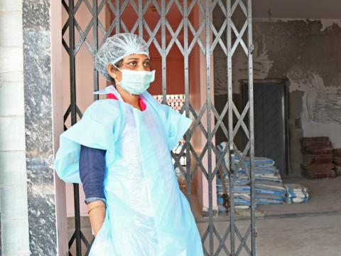 Healthcare worker at a new quarantine center in India