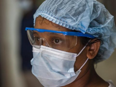 Masked healthcare worker in Bangladesh