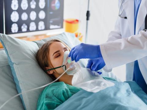 Hospital patient receiving supplemental oxygen