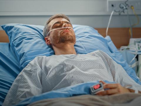 Hospital patient with nasal cannula