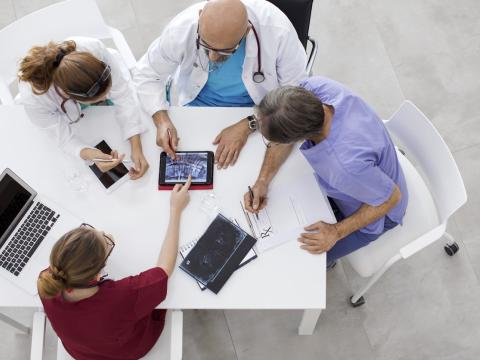 Medical team consultation aerial view