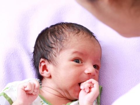 Mom tending to newborn