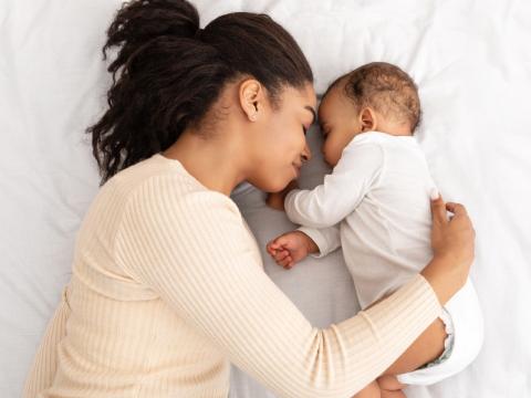 Mom snuggling with baby