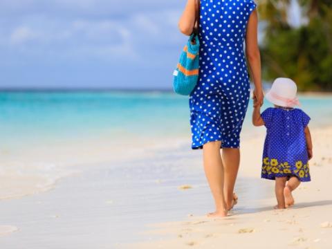 Mother and toddler on tropical beach