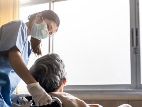 Nurse with nursing home resident
