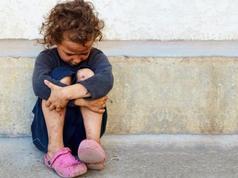 Orphaned girl on street
