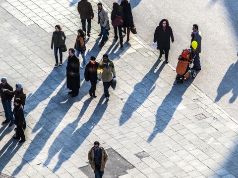 Overhead view of people on plaza