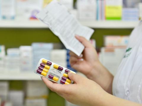 Pharmacist filling prescription