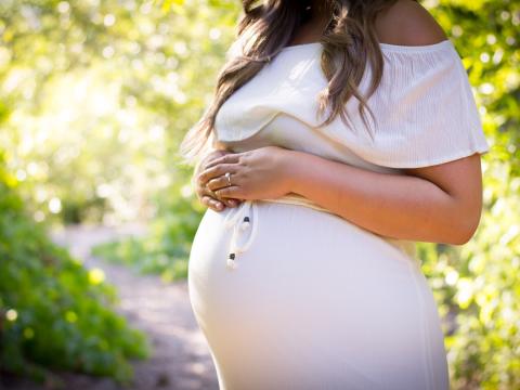 Pregnant woman in the summer