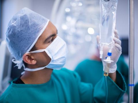 Surgeon with IV