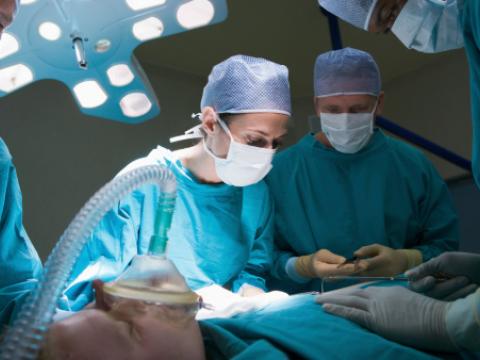 Surgeons operating