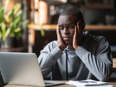 Tired student doing remote learning
