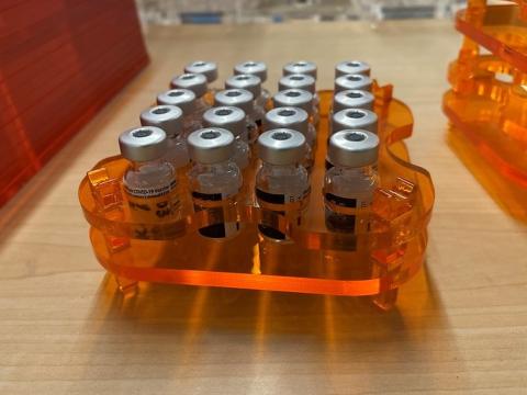Trays of Pfizer COVID vaccine vials