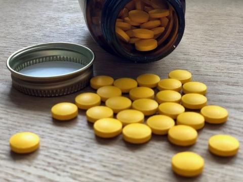 Vitamin D pills and bottle
