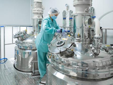 Worker at drug manufacturing plant