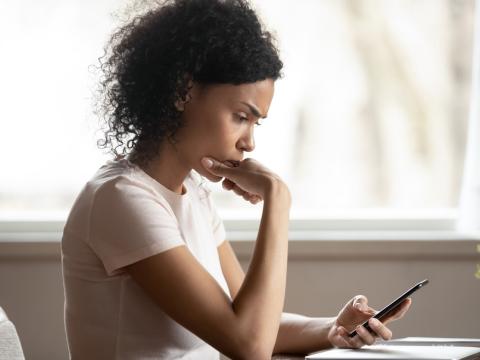 Woman checking smartphone