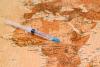 Africa map with syringe