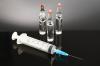 Vaccine vials and syringe