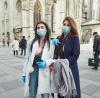 Austrian tourists wearing masks, gloves