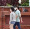 Couple wearing masks outside in Baltimore